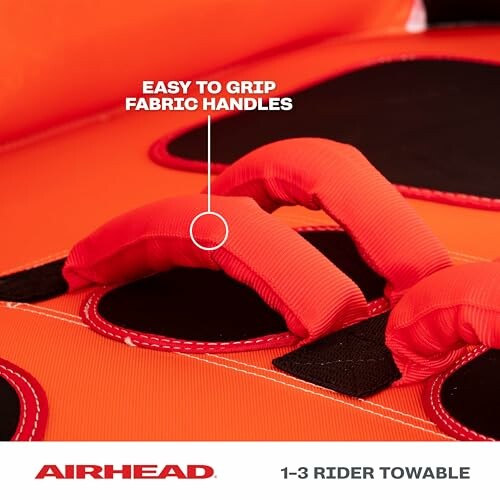 Towable tube with easy to grip fabric handles.