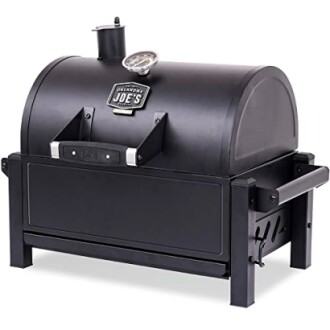 Oklahoma Joe's portable charcoal grill with temperature gauge.