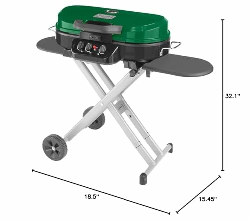 Coleman RoadTrip 285 Portable Grill with green lid and foldable stand